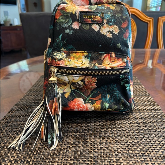 🇺🇸Bebe Black Floral Backpack with Gold Hardware and Tassel NWOT